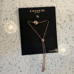 Rose gold COACH slider bracelet